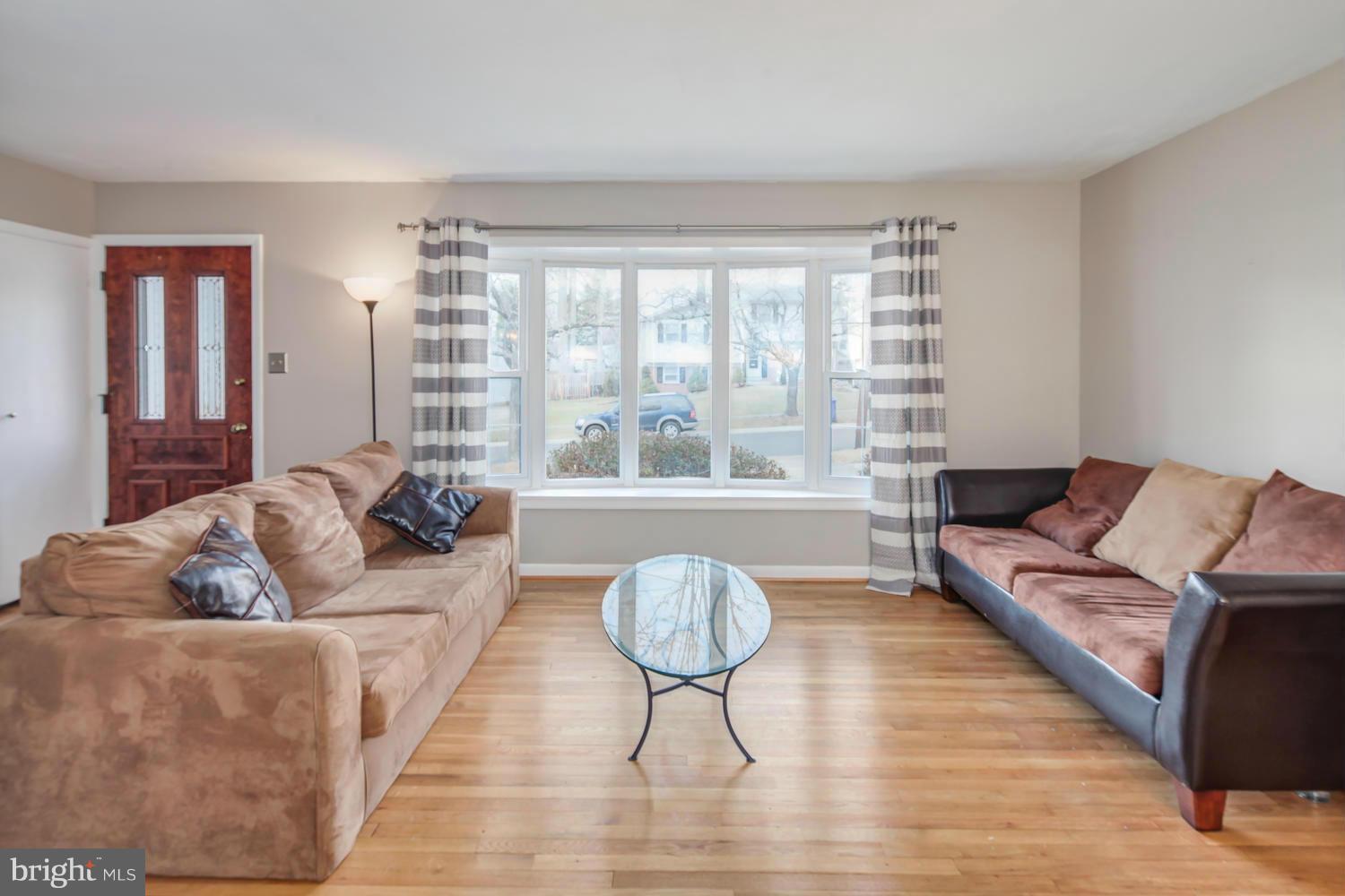 4106 Delancy Drive Silver Spring, MD 20906 - Photo 3 of 30 a living room with furniture and a large window