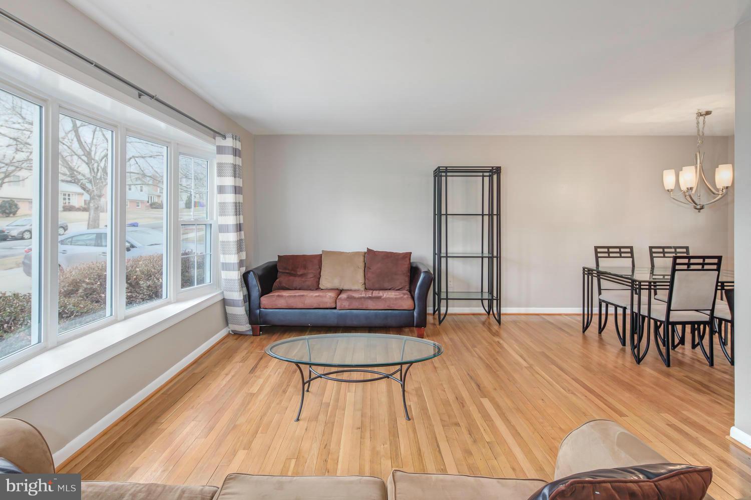 4106 Delancy Drive Silver Spring, MD 20906 - Photo 5 of 30 a living room with furniture and a wooden floor
