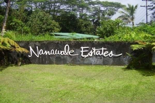 Seaview Road Pahoa, HI 96778 - Photo 6 of 7 a view of a park with a bench under an umbrella