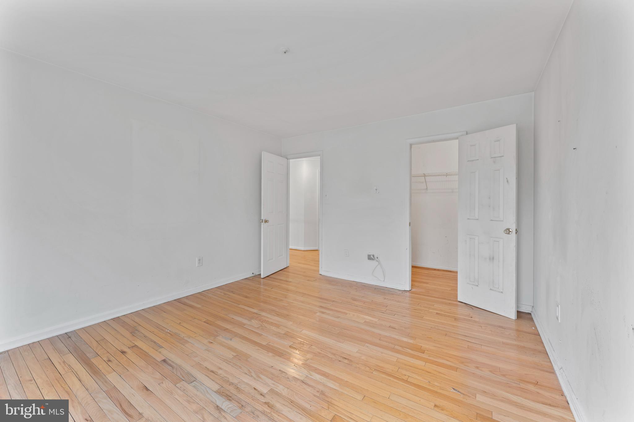 10110 Goose Pond Court Laurel, MD 20708 - Photo 19 of 46 a view of empty room with wooden floor