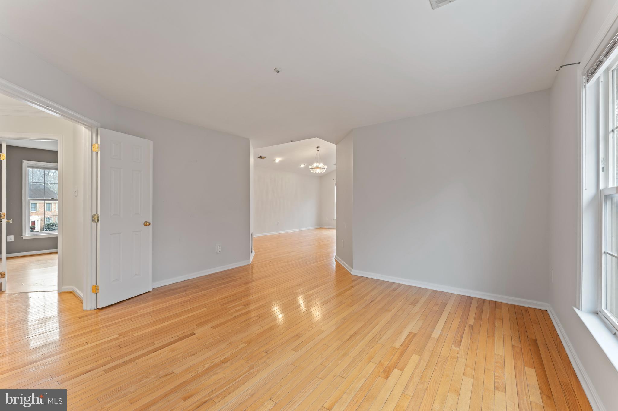 10110 Goose Pond Court Laurel, MD 20708 - Photo 29 of 46 a view of empty room with wooden floor