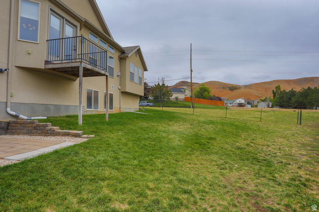 426 Deer Hollow Road Tooele, UT 84074 - Photo 33 of 37 View of yard featuring a mountain view