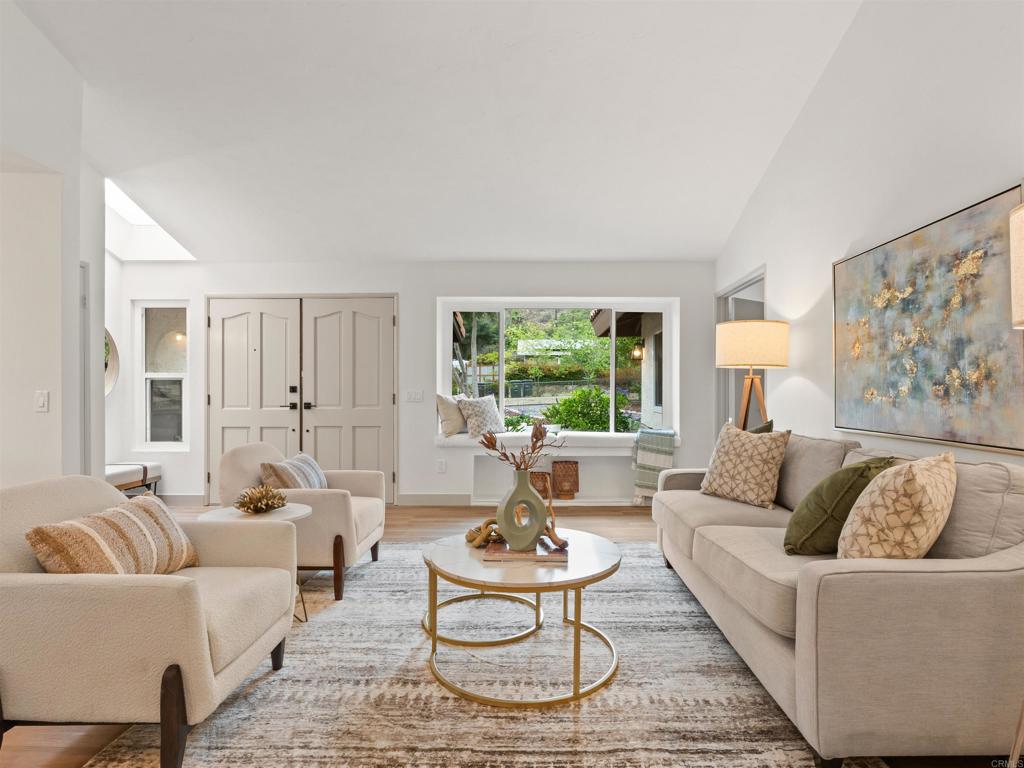 13737 Temple Street Poway, CA 92064 - Photo 8 of 38 a living room with furniture and a large window