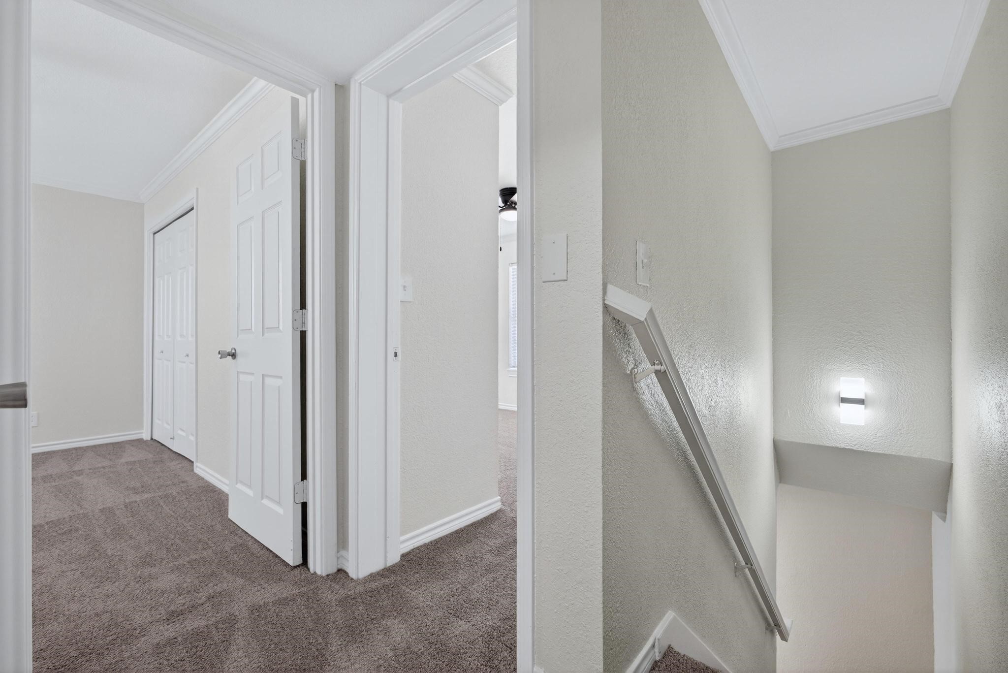 1221 Cedar Post Lane, Unit 1D Houston, TX 77055 - Photo 14 of 24 a view of a hallway with closet area