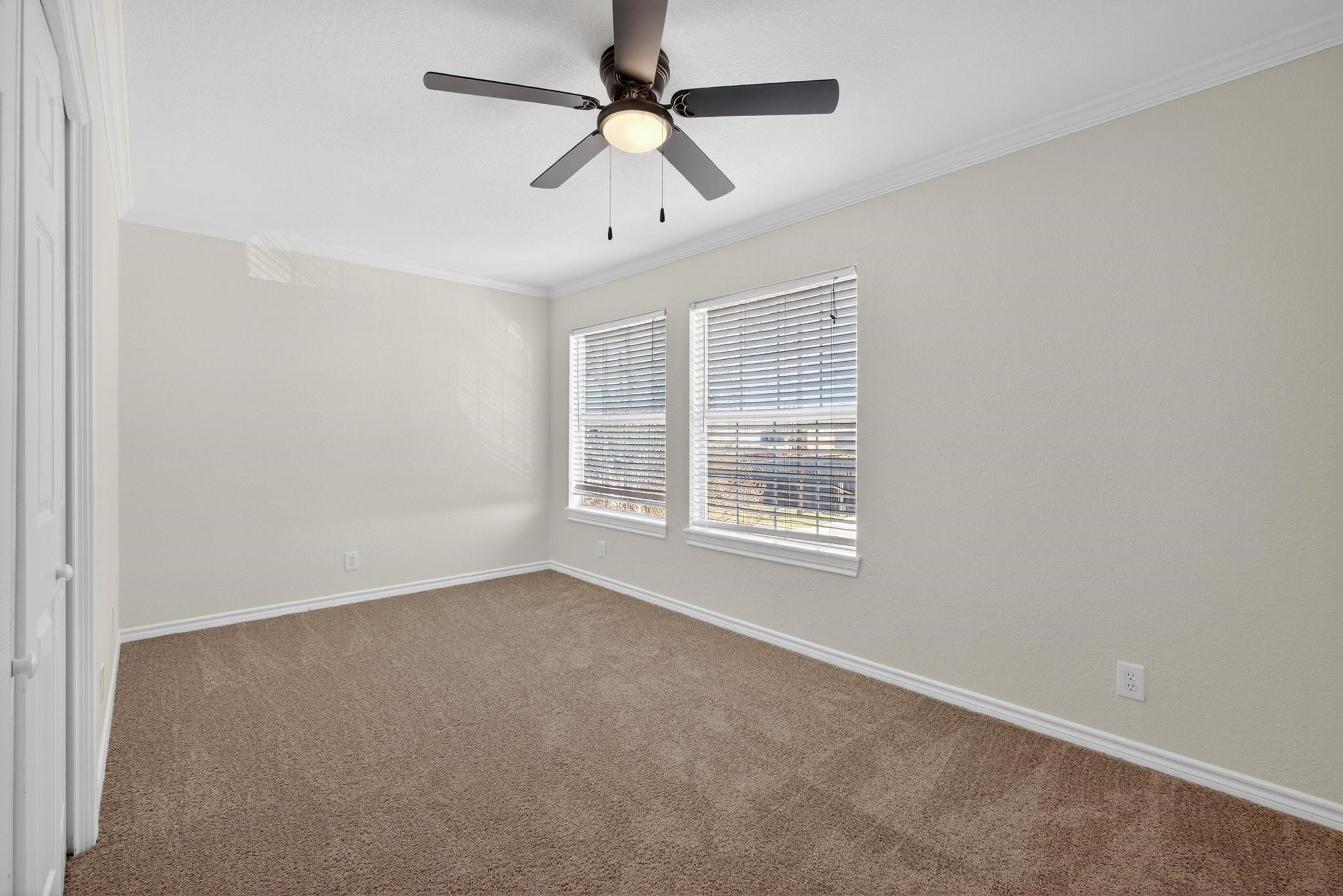 1221 Cedar Post Lane, Unit 1D Houston, TX 77055 - Photo 19 of 24 a view of an empty room with a window