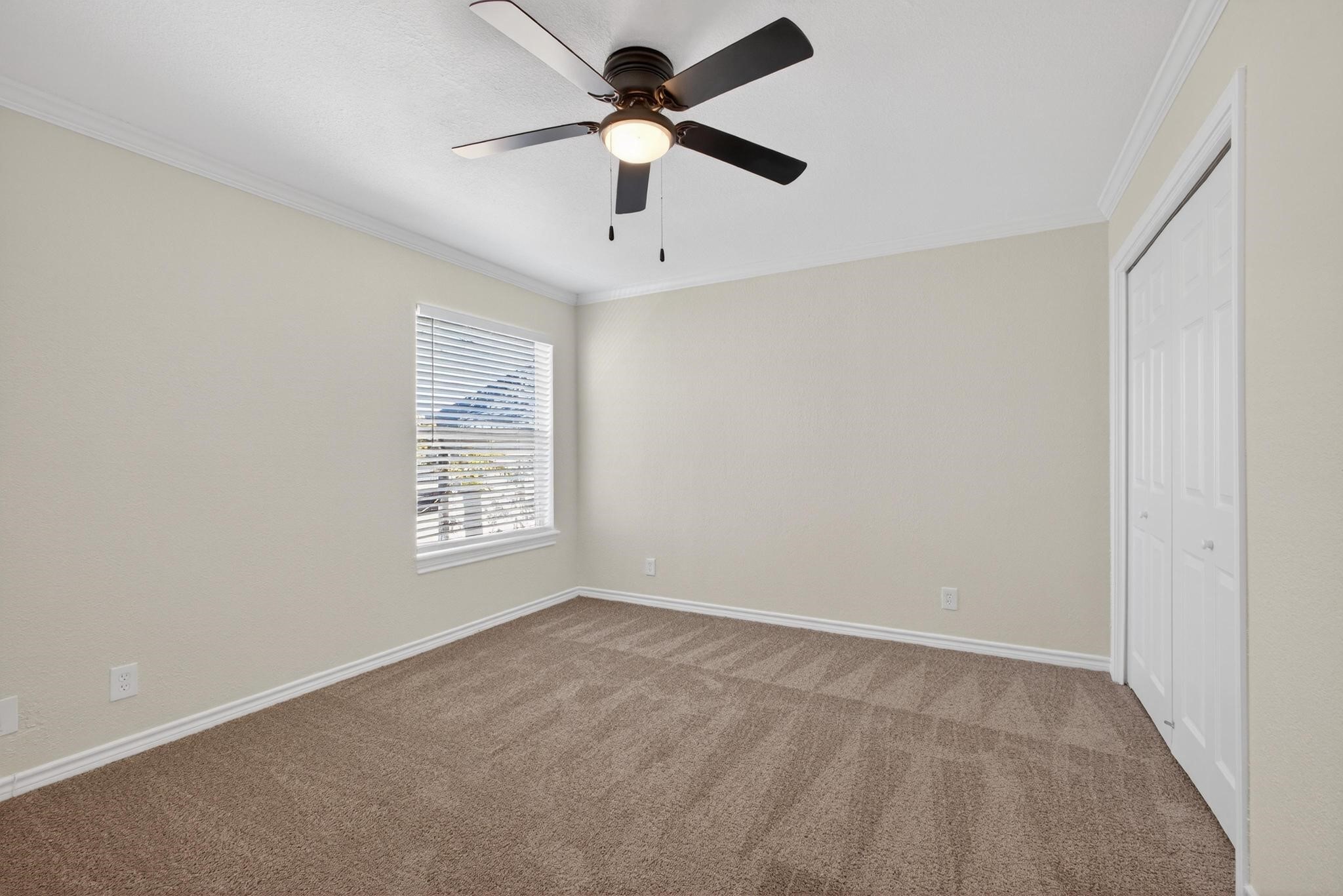 1221 Cedar Post Lane, Unit 1D Houston, TX 77055 - Photo 21 of 24 a view of an empty room with a window