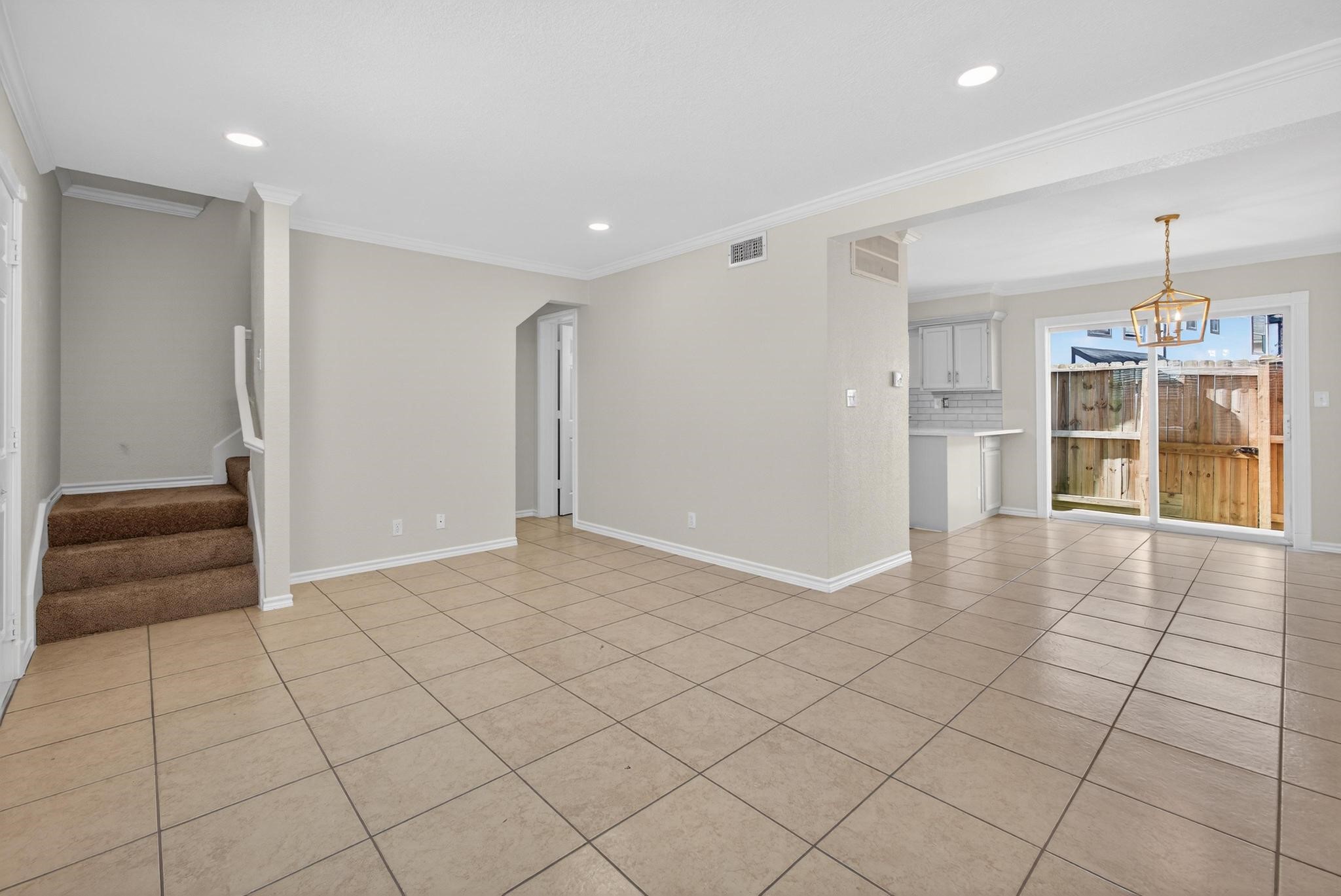 1221 Cedar Post Lane, Unit 1D Houston, TX 77055 - Photo 5 of 24 a view of an empty room with a window
