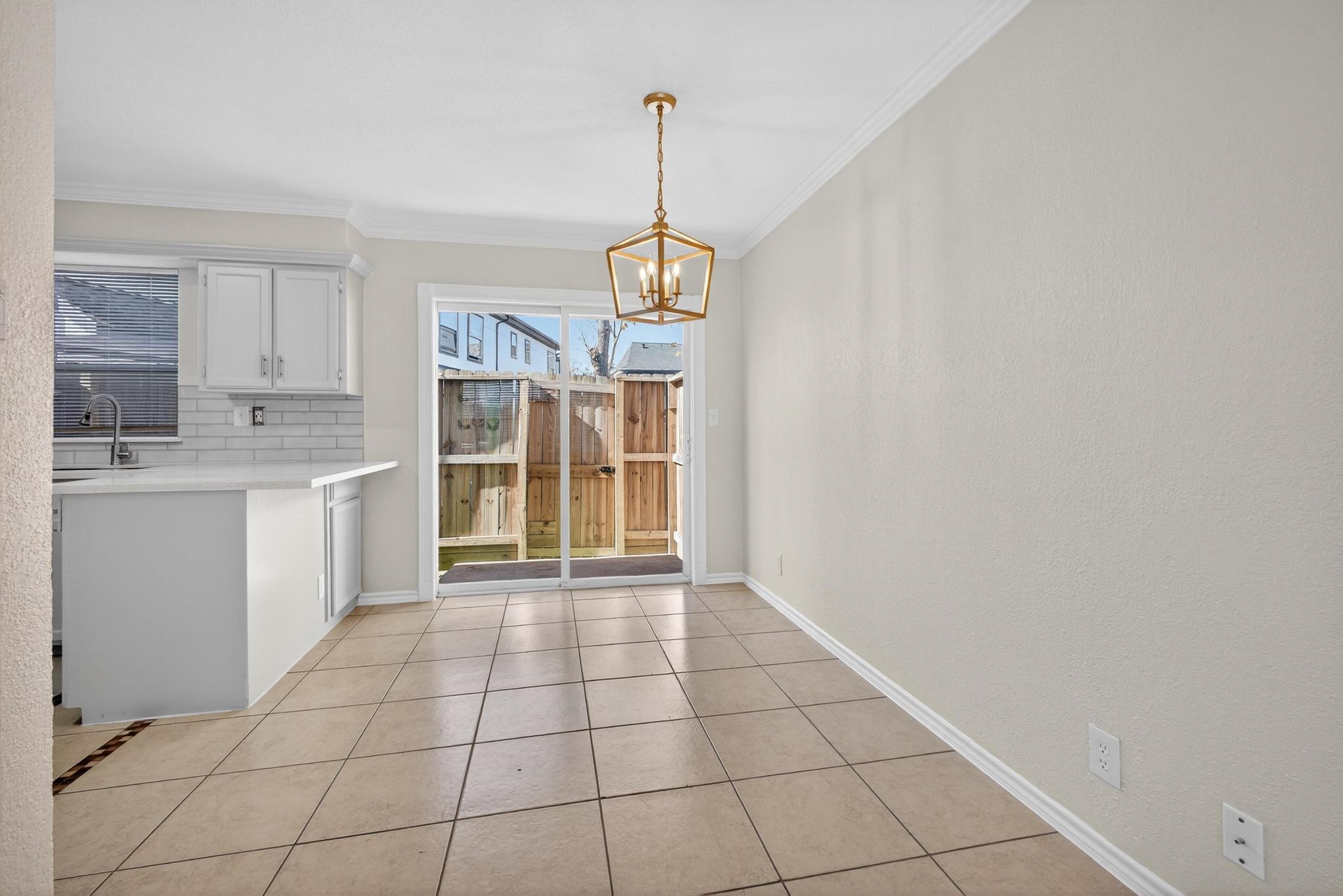 1221 Cedar Post Lane, Unit 1D Houston, TX 77055 - Photo 6 of 24 a view of a kitchen with wooden floor and a window