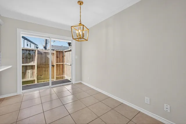 a view of an empty room and window