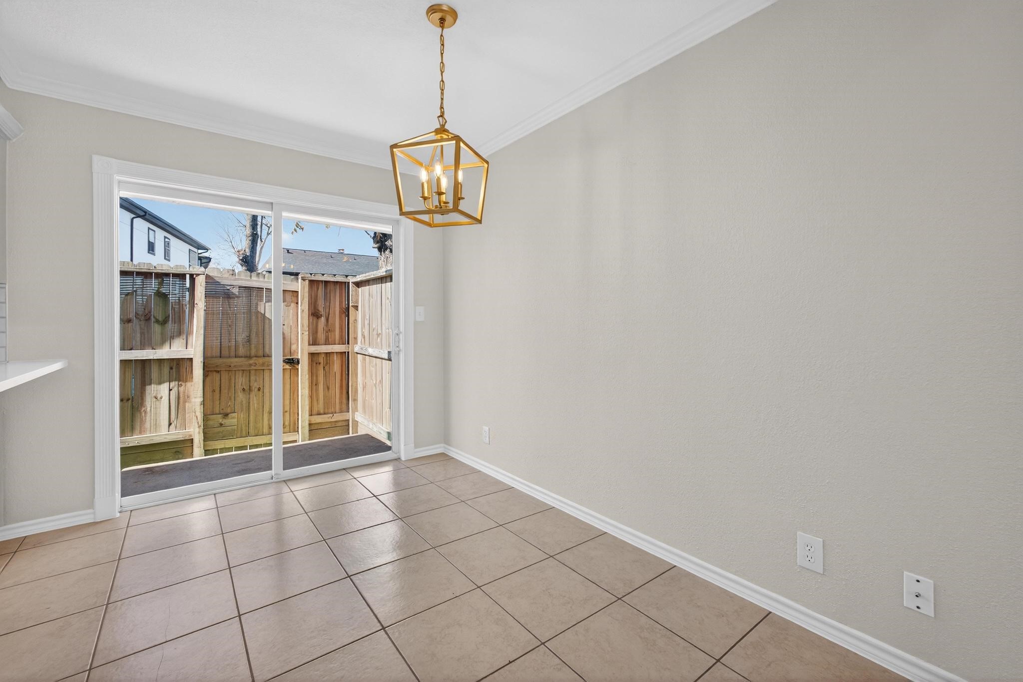 1221 Cedar Post Lane, Unit 1D Houston, TX 77055 - Photo 7 of 24 a view of an empty room and window