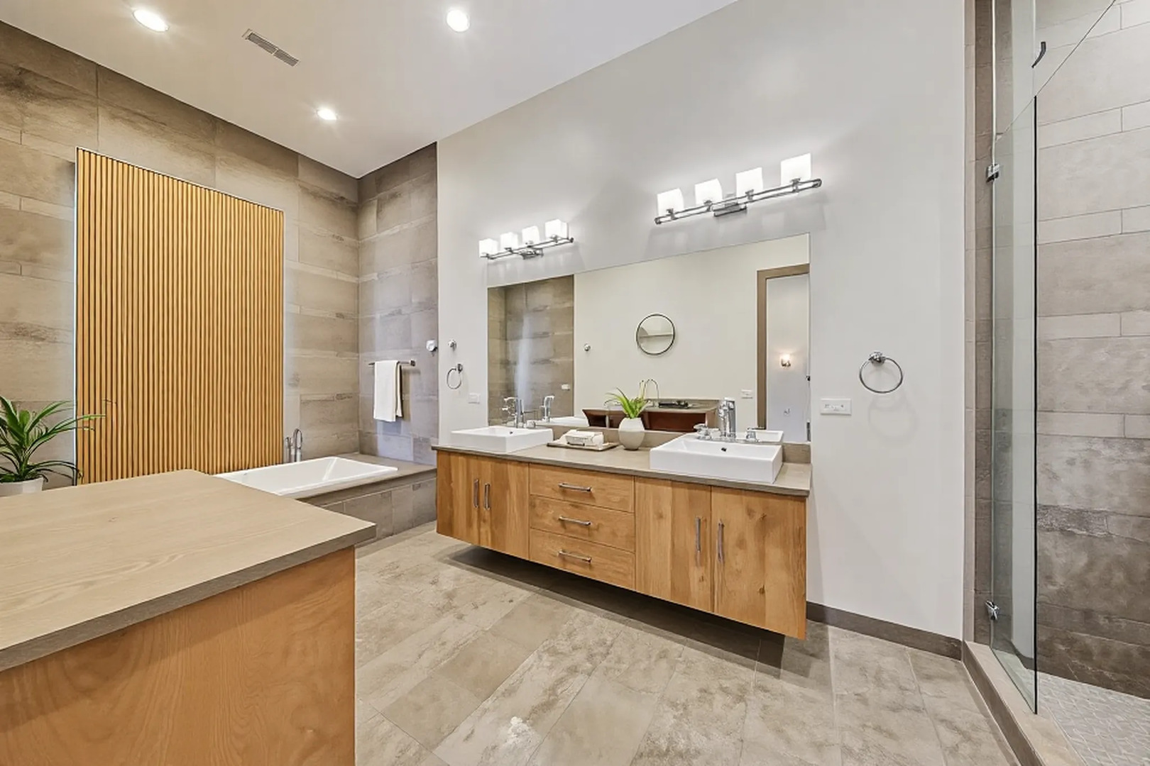 821 West Fulton Market, Unit 2 Chicago, IL 60607 - Photo 12 of 20 a spacious bathroom with a granite countertop sink a mirror and a shower