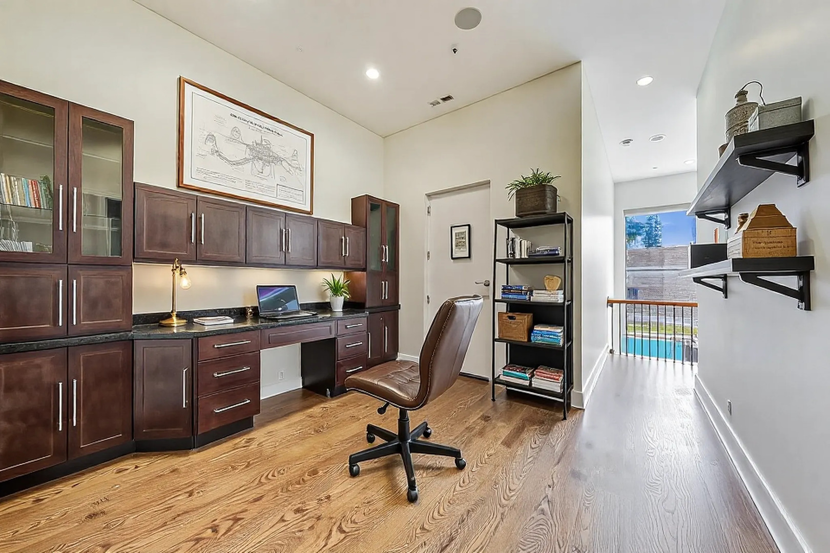 821 West Fulton Market, Unit 2 Chicago, IL 60607 - Photo 17 of 20 a view of a kitchen with furniture and wooden floor