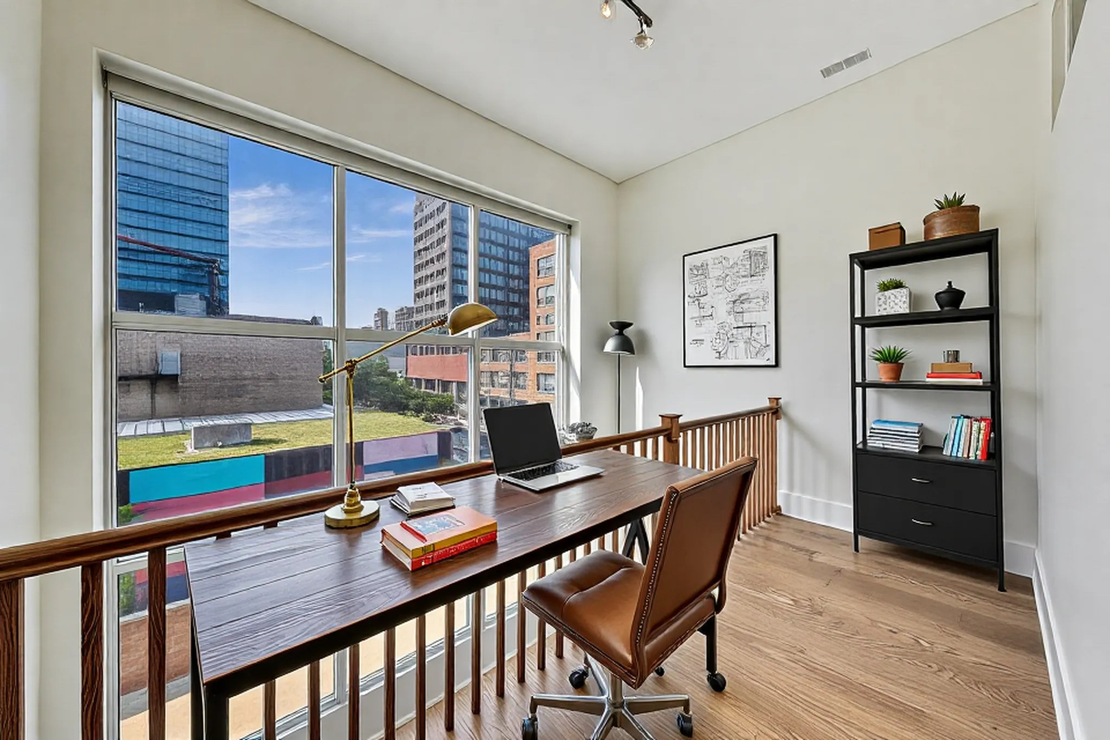 821 West Fulton Market, Unit 2 Chicago, IL 60607 - Photo 18 of 20 a view of a workspace with furniture and a window