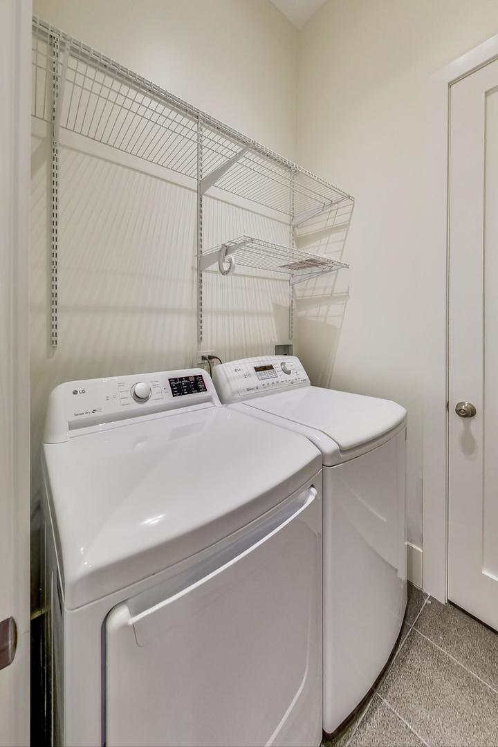 821 West Fulton Market, Unit 2 Chicago, IL 60607 - Photo 20 of 20 a utility room with dryer and washer