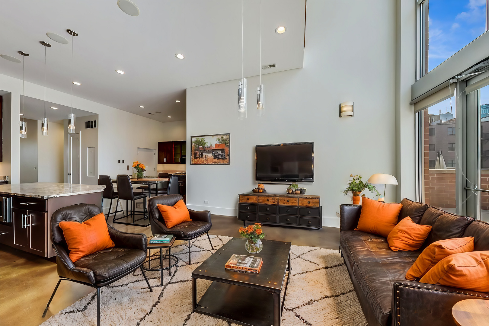 821 West Fulton Market, Unit 2 Chicago, IL 60607 - Photo 3 of 20 a living room with furniture and a flat screen tv