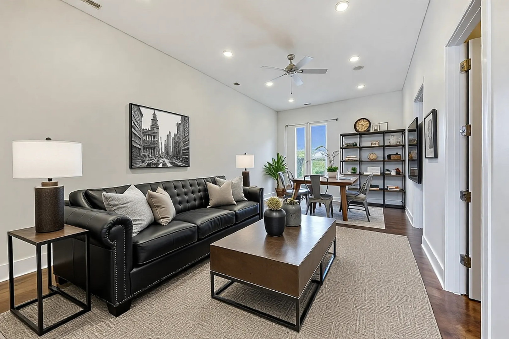 821 West Fulton Market, Unit 2 Chicago, IL 60607 - Photo 4 of 20 a living room with furniture kitchen view and a painting