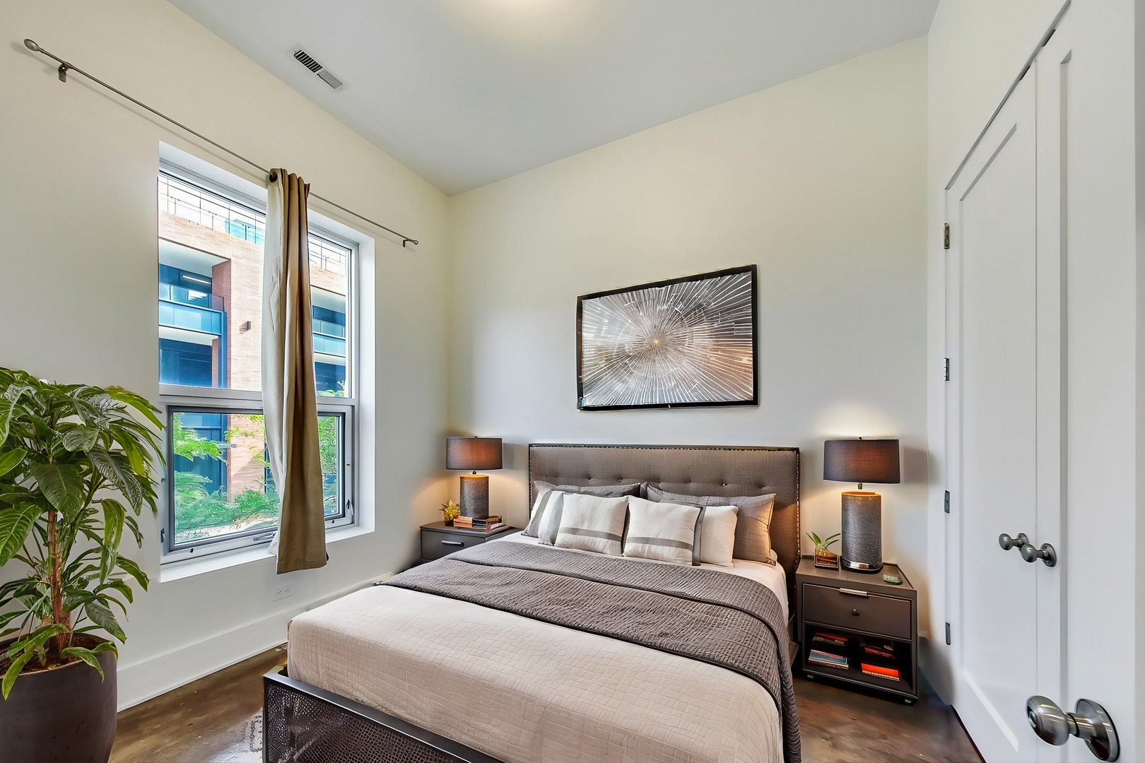 821 West Fulton Market, Unit 2 Chicago, IL 60607 - Photo 9 of 20 a bedroom with a bed and a painting on the wall