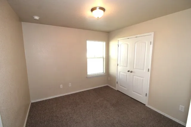 wooden floor and window in a room
