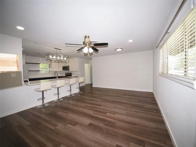 a view of kitchen and windows