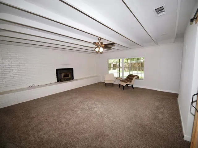 a view of a livingroom with a flat screen tv