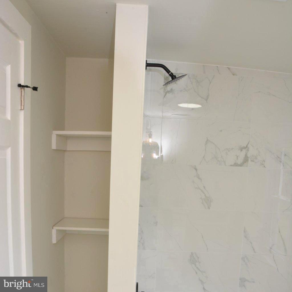 1006 Circle Drive Keymar, MD 21757 - Photo 11 of 45 Sleek shower with modern finishes.