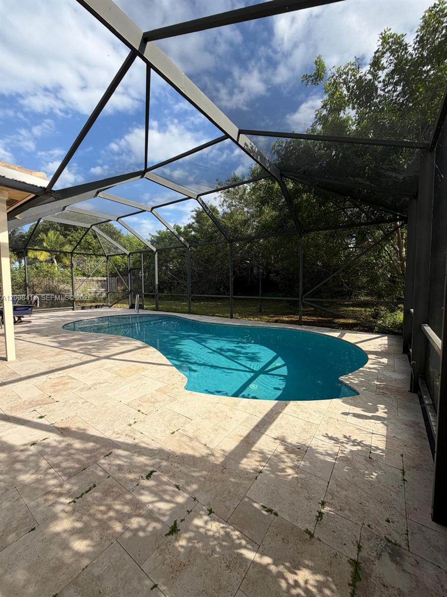 12680 Little Palm Lane Boca Raton, FL 33428 - Photo 8 of 13 a view of a backyard