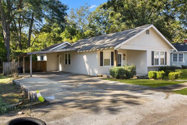 313 West Congress Street Brookhaven, MS 39601 - Photo 2 of 19 Left side of home driveway and carport