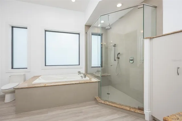 a view of entryway with wooden floor