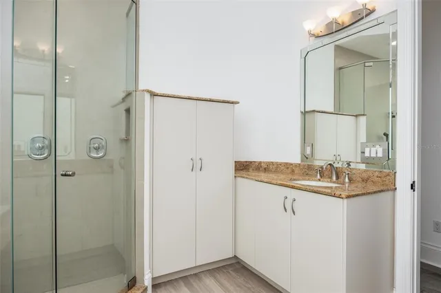 a kitchen with stainless steel appliances a refrigerator and a sink