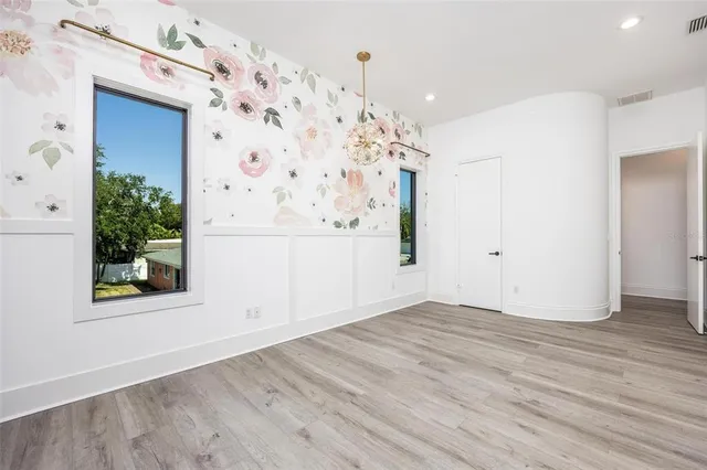 a view of room with window and fireplace