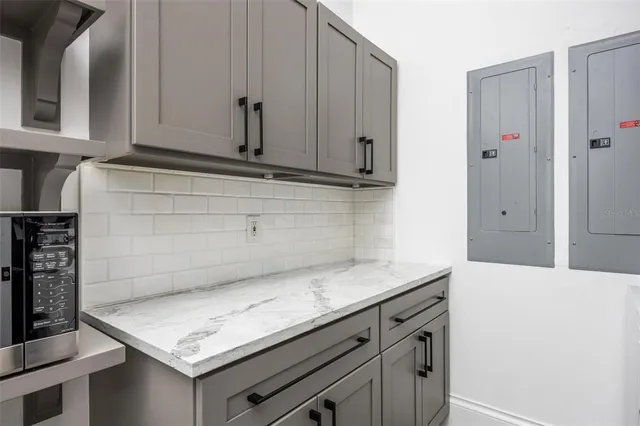 a view of a balcony with wooden floor and outdoor space
