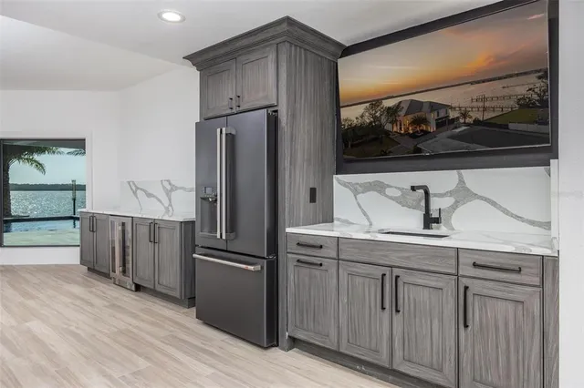 a view of a swimming pool with a lounge chairs