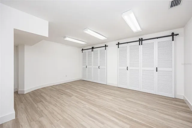 a view of a swimming pool with a lounge chairs