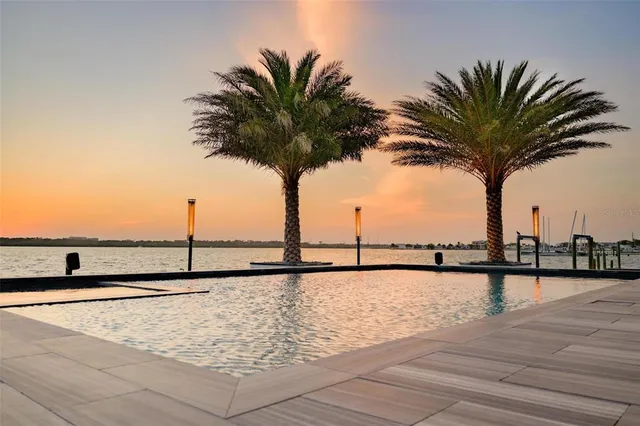a view of a terrace with wooden floor and seating space