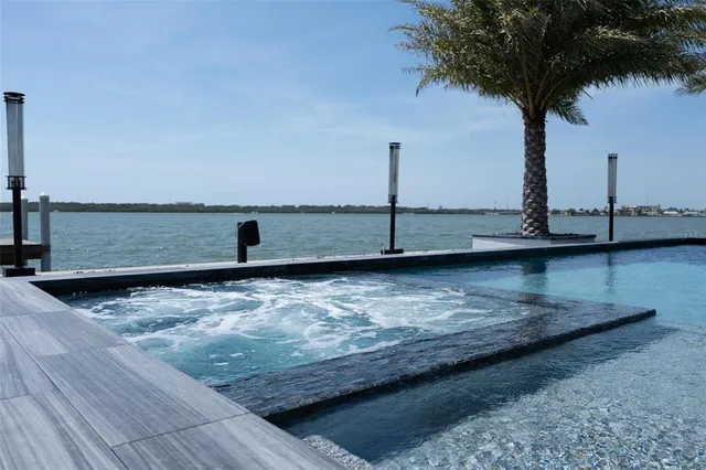 a view of a room with window and wooden floor
