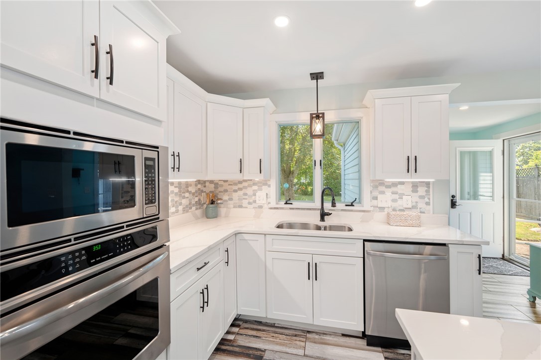 9 Woodlund Avenue Westerly, RI 02891 - Photo 11 of 47 Wall mounted oven and microwave