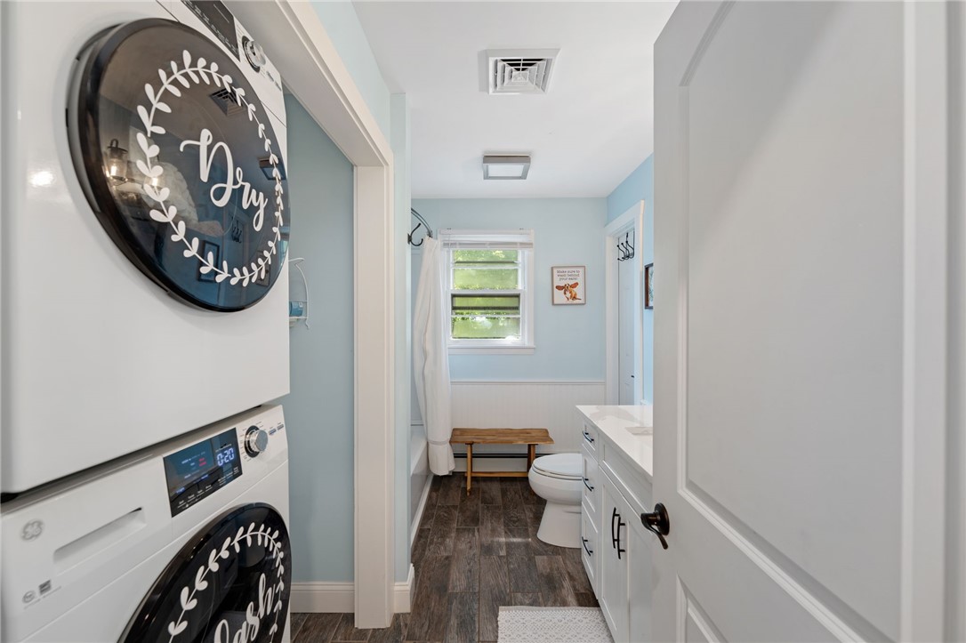 9 Woodlund Avenue Westerly, RI 02891 - Photo 28 of 47 Stackable washer and dryer in bath on main floor