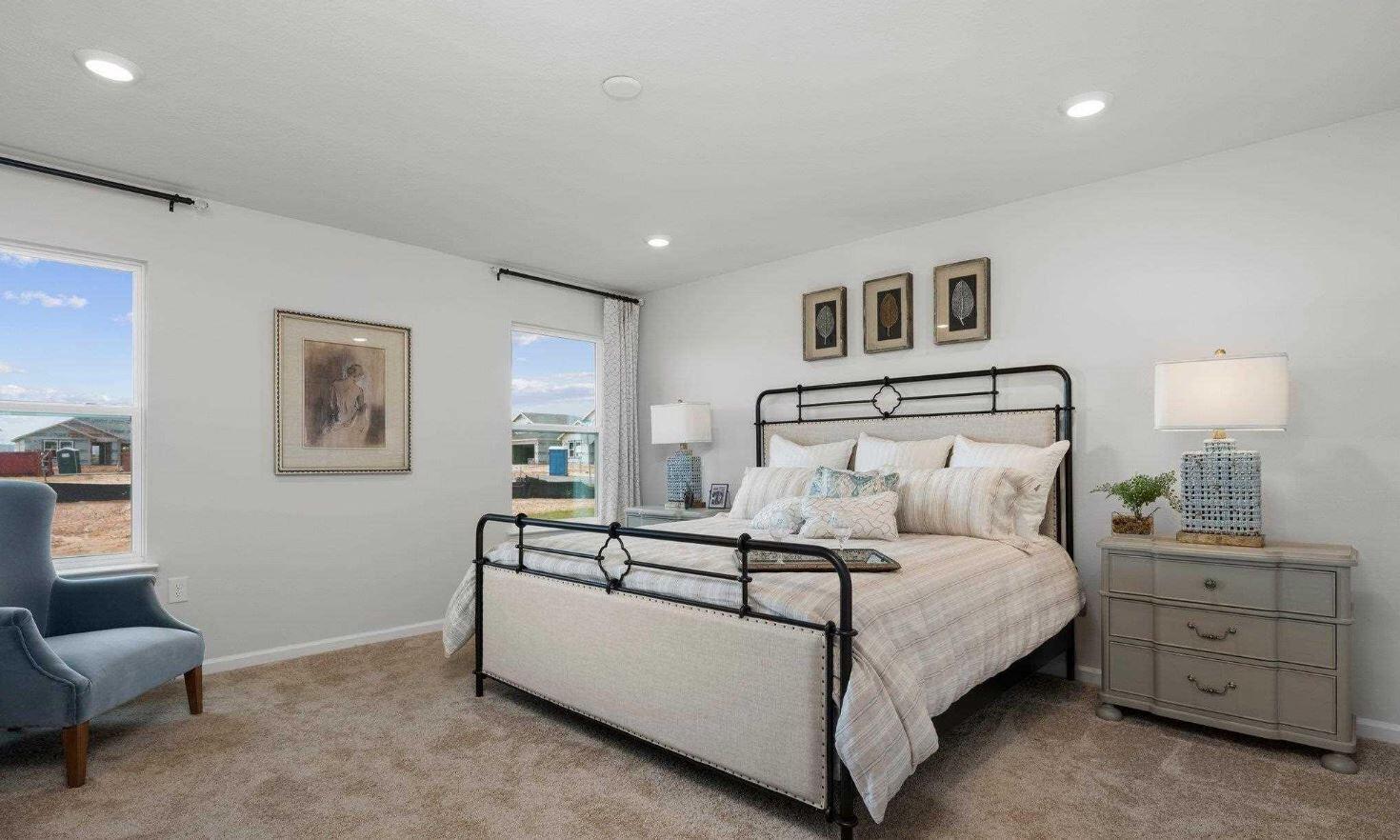 557 Mary Lou Way Crestview, FL 32539 - Photo 10 of 29 a bedroom with a bed and a couch