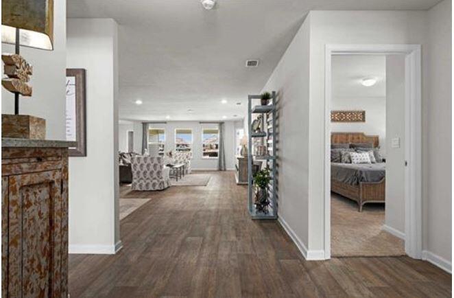 557 Mary Lou Way Crestview, FL 32539 - Photo 4 of 29 a view of livingroom with furniture and hardwood floor