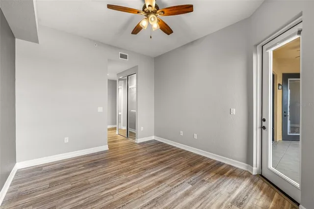 a bathroom with a double vanity sink a mirror and a shower