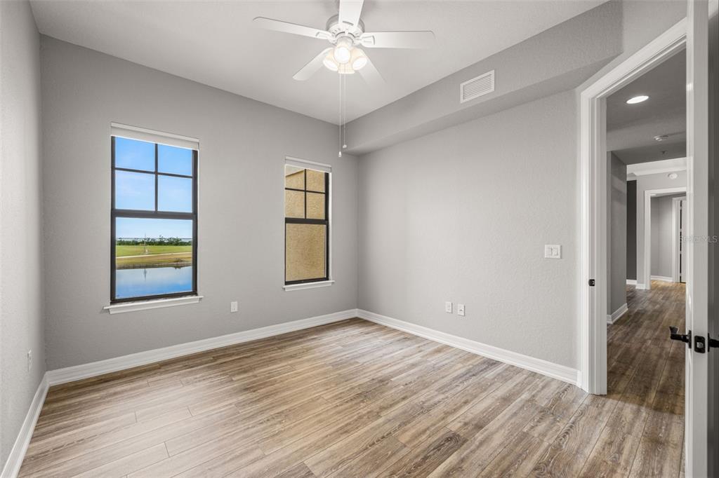 99 Vivante Boulevard, Unit 305/9935 Punta Gorda, FL 33950 - Photo 30 of 73 an empty room with windows and closet