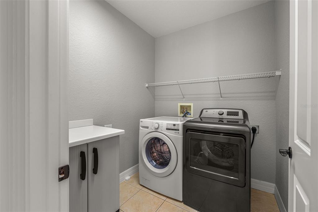 99 Vivante Boulevard, Unit 305/9935 Punta Gorda, FL 33950 - Photo 37 of 73 a utility room with dryer and washer