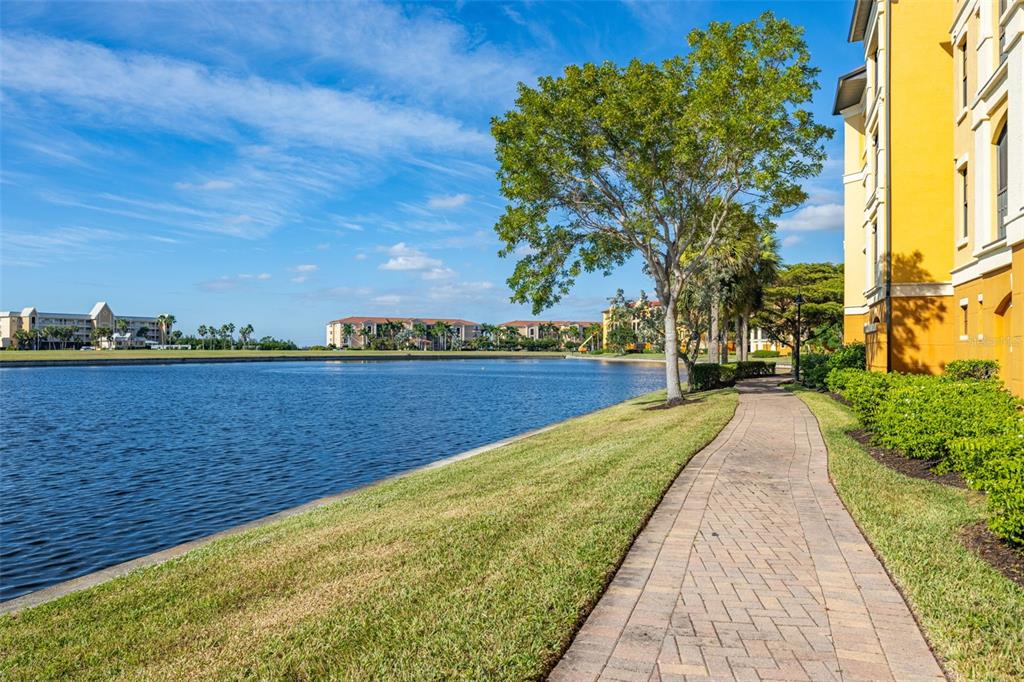 99 Vivante Boulevard, Unit 305/9935 Punta Gorda, FL 33950 - Photo 44 of 73 a view of swimming pool with outdoor space and seating area