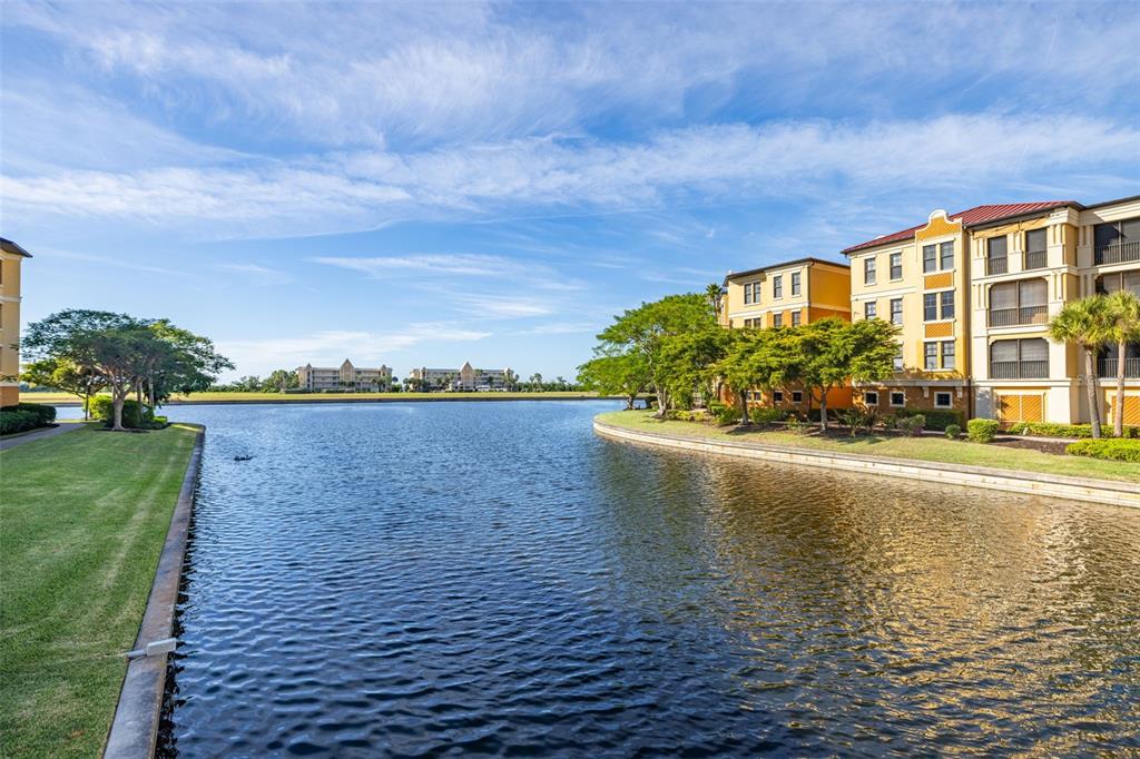 99 Vivante Boulevard, Unit 305/9935 Punta Gorda, FL 33950 - Photo 47 of 73 a view of an ocean with a building in the background
