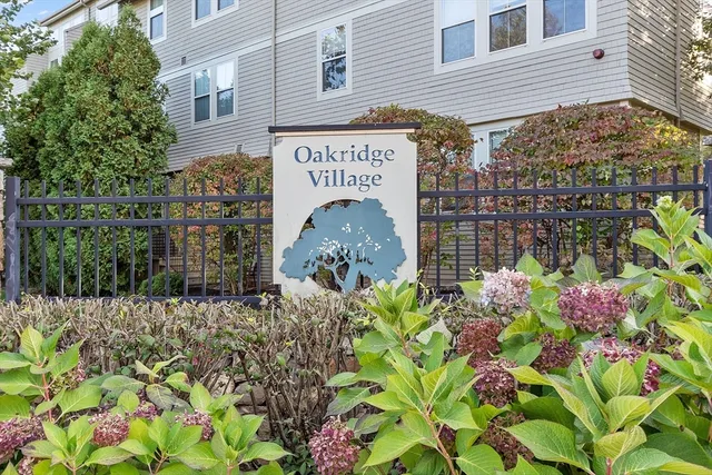 a sign that is on the side of the house