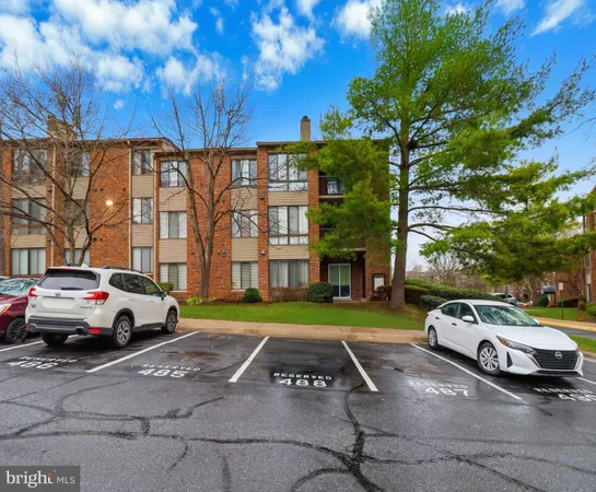 a view of a cars parked in front of a house