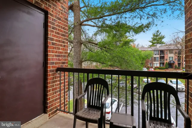 a view of a balcony with a swing