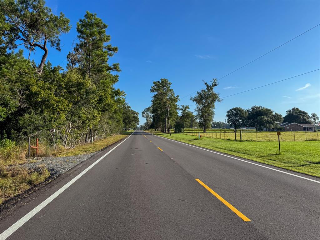 2 Edgerly Road Dequincy, LA 70633 - Photo 12 of 14 a view of a road with a yard
