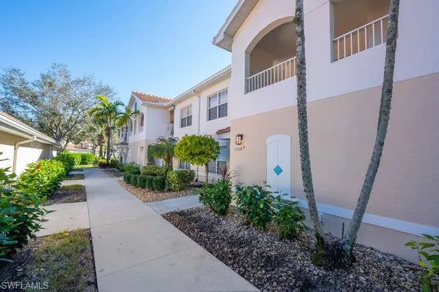 a view of a pathway with a house