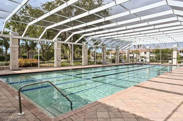 a view of a building with a backyard